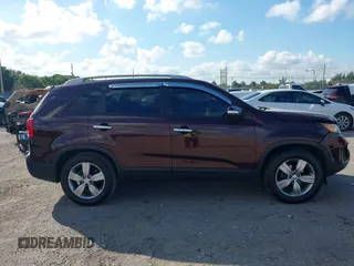 2012 Kia Sorento EX with VIN 5XYKU3A67CG224950, listed as a IAAI auction lot 41523784 with 113,930 mi miles. Bid and sale history available at carsss.com. Image 13.