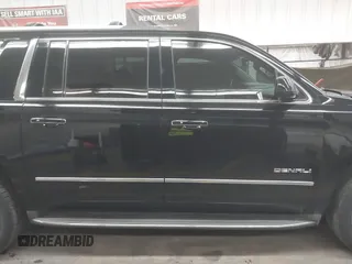 2016 GMC Yukon XL Denali with VIN 1GKS2HKJ8GR102213, listed as a IAAI auction lot 41818737 with 154,607 mi miles and . Bid and sale history available at DreamBid. Image 13.