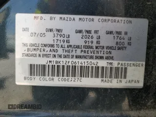 2006 Mazda 3 i with VIN JM1BK12F061415042, listed as a Copart auction lot 51121795 with 120,870 mi miles and Salvage Title. Bid and sale history available at DreamBid. Image 15.