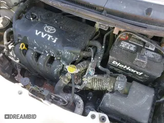 2007 Toyota Yaris with VIN JTDJT923475077877, listed as a IAAI auction lot 42073834 with 210,145 mi miles. Bid and sale history available at carsss.com. Image 6.