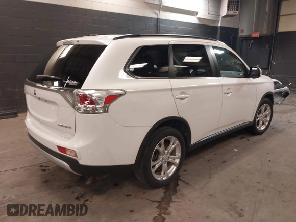 2015 Mitsubishi Outlander SE with VIN JA4AZ3A39FZ012490, listed as a IAAI auction lot 41405104 with 95,131 mi miles and . Bid and sale history available at DreamBid. Image 4.