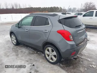 2015 Buick Encore Convenience with VIN KL4CJFSBXFB033767, listed as a IAAI auction lot 41447019 with 131,954 mi miles and . Bid and sale history available at carsss.com. Image 3.