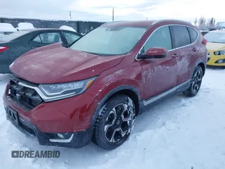 2018 Honda CR-V Touring with VIN 5J6RW1H95JL006062, listed as a IAAI auction lot 41072002 with 50,930 mi miles and . Bid and sale history available at DreamBid. Image 17.