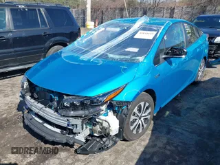 2021 Toyota Prius LE with VIN JTDKAMFP1M3166050, listed as a IAAI auction lot 41831145 with 54,350 mi miles and . Bid and sale history available at DreamBid. Image 2.