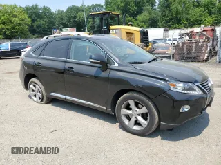 2015 Lexus RX 350 with VIN 2T2BK1BA7FC334891, listed as a Copart auction lot 60450545 with 210,500 mi miles and Salvage title. Bid and sale history available at DreamBid. Image 4.