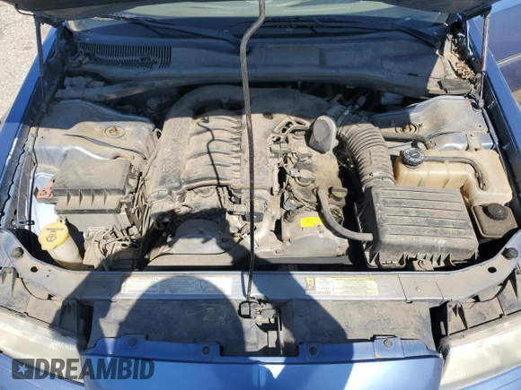 2007 Chrysler 300 Touring z VIN 2C3KA53G17H846188, wystawiony jako Copart lot #56031625 z przebiegiem 121 198 mil mil oraz Szkoda całkowita • Salvage title. Historia ofert i sprzedaży dostępna na DreamBid. Obrazek 11.