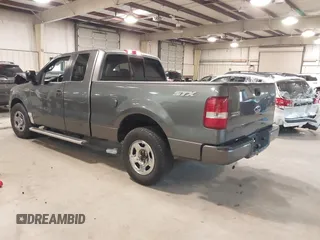 2005 Ford F-150 STX with VIN 1FTRX12W95NB38107, listed as a IAAI auction lot 41185100 with 201,171 mi miles. Bid and sale history available at carsss.com. Image 3.