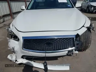 2014 Infiniti Q50 Premium with VIN JN1BV7ARXEM706864, listed as a IAAI auction lot 41787396 with 143,726 mi miles. Bid and sale history available at carsss.com. Image 6.