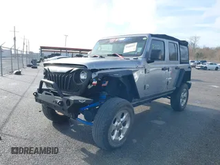 2020 Jeep Wrangler Unlimited Sport S with VIN 1C4HJXDG4LW221778, listed as a IAAI auction lot 41441662 with 76,026 mi miles and . Bid and sale history available at DreamBid. Image 2.