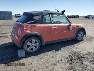 2005 MINI Convertible z VIN WMWRF33585TF62541, wystawiony jako Copart lot #49868625 z przebiegiem Nie podano mil oraz Szkoda całkowita • Salvage title. Historia ofert i sprzedaży dostępna na DreamBid. Obrazek 3.