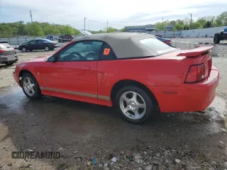 2003 Ford Mustang Deluxe z VIN 1FAFP44403F407589, wystawiony jako Copart lot #54002265 z przebiegiem 176 019 mil mil oraz Nie do naprawy • Non repairable. Historia ofert i sprzedaży dostępna na DreamBid. Obrazek 2.