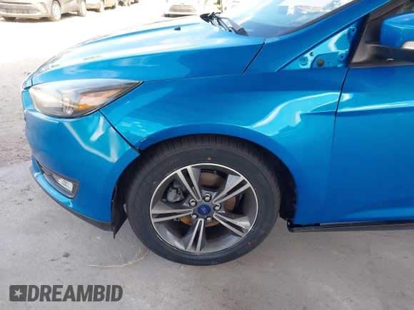 2016 Ford Focus SE with VIN 1FADP3FE3GL226145, listed as a IAAI auction lot 42166519 with 85,769 mi miles. Bid and sale history available at carsss.com. Image 6.