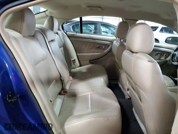 2015 Ford Taurus SEL with VIN 1FAHP2E94FG149695, listed as a Copart auction lot 65609184 with 126,803 mi miles and Salvage Title. Bid and sale history available at DreamBid. Image 10.