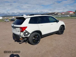 2019 Honda Passport Elite z VIN 5FNYF8H0XKB001472, wystawiony jako IAAI lot #42143890 z przebiegiem 98 119 mil mil oraz . Historia ofert i sprzedaży dostępna na DreamBid. Obrazek 4.