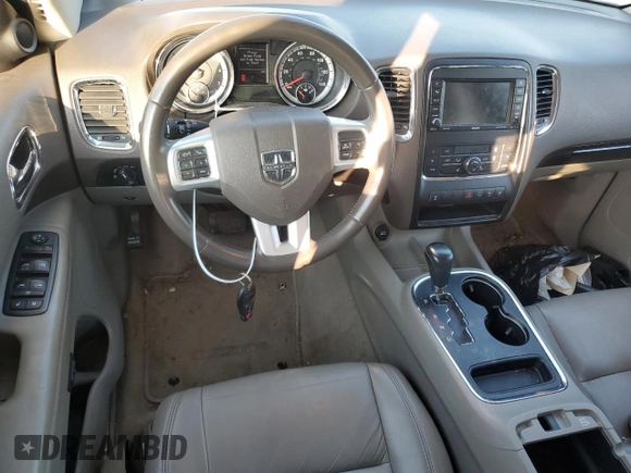 2013 Dodge Durango Crew with VIN 1C4RDHDG1DC616909, listed as a Copart auction lot 61923565 with 98,264 mi miles and Salvage title. Bid and sale history available at DreamBid. Image 8.