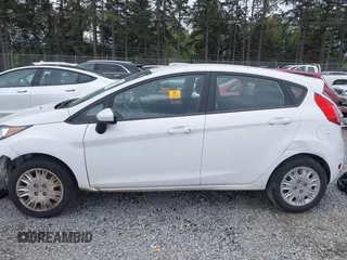 2016 Ford Fiesta S z VIN 3FADP4TJ8GM193620, wystawiony jako IAAI lot #42131839 z przebiegiem 155 664 mil mil oraz . Historia ofert i sprzedaży dostępna na DreamBid. Obrazek 15.