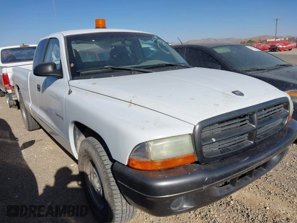 2002 Dodge Dakota with VIN 1B7GL12X32S701273, listed as a IAAI auction lot 41552573 with 157,212 mi miles and . Bid and sale history available at carsss.com. Image 12.
