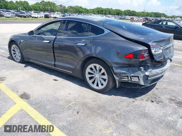 2016 Tesla Model S 70 with VIN 5YJSA1E16GF156312, listed as a IAAI auction lot 42469451 with 90,317 mi miles and . Bid and sale history available at DreamBid. Image 3.