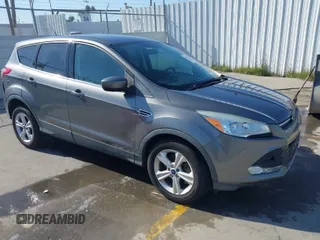 2014 Ford Escape SE with VIN 1FMCU0G99EUE40879, listed as a IAAI auction lot 41981814 with 65,734 mi miles. Bid and sale history available at carsss.com. Image 1.
