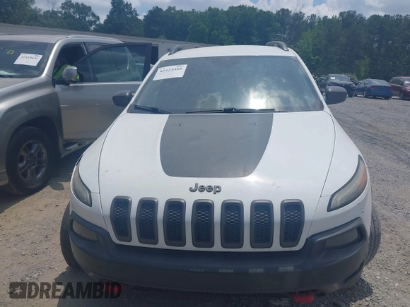 2015 Jeep Cherokee Trailhawk z VIN 1C4PJMBS3FW511564, wystawiony jako IAAI lot #42424468 z przebiegiem 169 167 mil mil oraz . Historia ofert i sprzedaży dostępna na DreamBid. Obrazek 12.