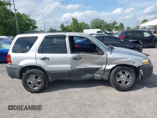 2005 Ford Escape XLS Value with VIN 1FMYU02Z35KD87671, listed as a IAAI auction lot 41880824 with 278,689 mi miles. Bid and sale history available at carsss.com. Image 13.