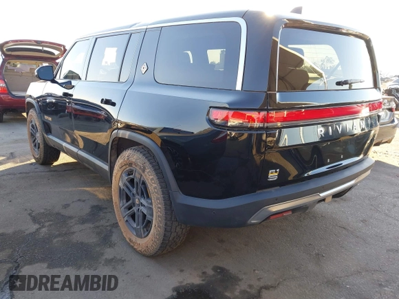 2024 Rivian R1S Adventure with VIN 7PDSGABAXRN034598, listed as a IAAI auction lot 41312180 with 23,615 mi miles. Bid and sale history available at carsss.com. Image 3.