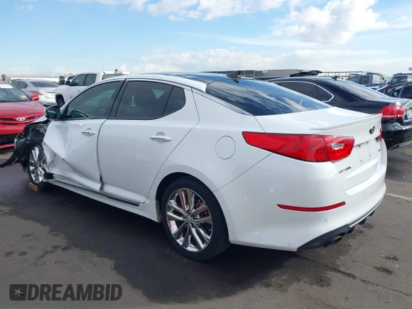 2014 Kia Optima SX Turbo with VIN 5XXGR4A66EG338250, listed as a IAAI auction lot 41583587 with 127,814 mi miles and . Bid and sale history available at DreamBid. Image 3.