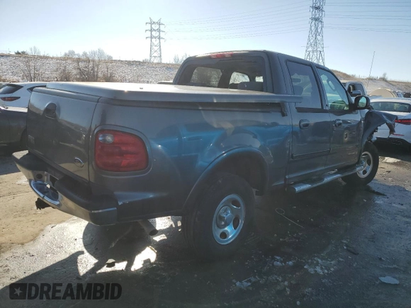 2003 Ford F-150 XLT with VIN 1FTRW08673KA38056, listed as a Copart auction lot 42772435 with 129,104 mi miles and Salvage Title. Bid and sale history available at carsss.com. Image 3.