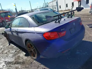 2014 BMW 4 Series 428i xDrive with VIN WBA3T1C58EPS98939, listed as a IAAI auction lot 41649313 with 35,994 mi miles and . Bid and sale history available at carsss.com. Image 3.