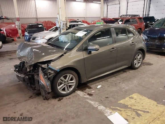 2019 Toyota Corolla Hatchback SE with VIN JTNK4RBE1K3011063, listed as a IAAI auction lot 41656864 with 104,102 mi miles. Bid and sale history available at carsss.com. Image 2.