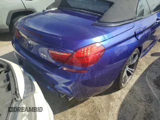 2012 BMW M6 z VIN WBSLZ9C59CC985456, wystawiony jako Copart lot #73796464 z przebiegiem 42 717 mil mil oraz Nie do naprawy • Non repairable. Historia ofert i sprzedaży dostępna na DreamBid. Obrazek 6.