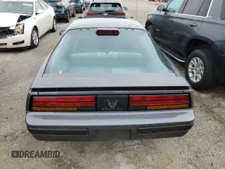 1986 Pontiac Firebird with VIN 1G2FS87S2GL247754, listed as a Copart auction lot 49340634 with 52,081 mi miles and Salvage Title. Bid and sale history available at carsss.com. Image 6.