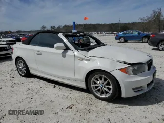 2010 BMW 1 Series 128i with VIN WBAUN1C5XAVH81789, listed as a Copart auction lot 49798465 with 128,859 mi miles and Clean title. Bid and sale history available at DreamBid. Image 4.