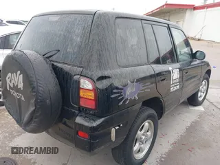 1999 Toyota RAV4 with VIN JT3GP10VXX7061972, listed as a IAAI auction lot 42474051 with 229,406 mi miles and . Bid and sale history available at DreamBid. Image 4.