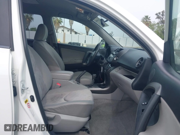 2009 Toyota RAV4 with VIN JTMZF33V49D012527, listed as a IAAI auction lot 42119902 with 160,617 mi miles. Bid and sale history available at carsss.com. Image 5.