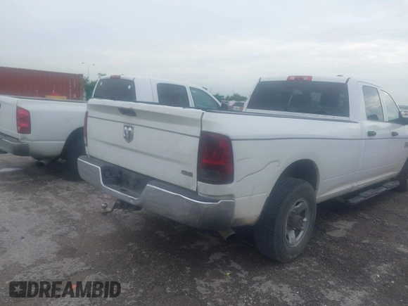 2012 Ram 2500 ST z VIN 3C6TD4HL7CG265349, wystawiony jako IAAI lot #42479271 z przebiegiem 301 419 mil mil oraz . Historia ofert i sprzedaży dostępna na DreamBid. Obrazek 4.