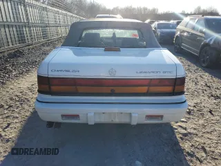1993 Chrysler LeBaron z VIN 1C3XU4534PF654847, wystawiony jako Copart lot #84391684 z przebiegiem 129 520 mil mil oraz Szkoda całkowita • Salvage title. Historia ofert i sprzedaży dostępna na DreamBid. Obrazek 6.
