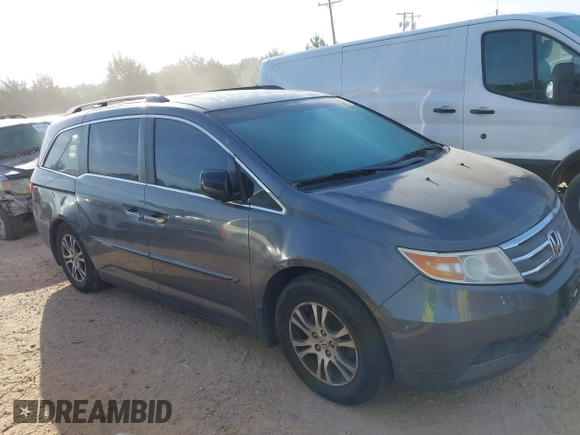 2012 Honda Odyssey EX-L with VIN 5FNRL5H63CB006272, listed as a IAAI auction lot 42074163 with 187,785 mi miles and . Bid and sale history available at carsss.com. Image 13.