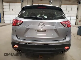 2013 Mazda CX-5 Sport z VIN JM3KE2BE4D0137115, wystawiony jako Copart lot #54487795 z przebiegiem 154 111 mil mil oraz Szkoda całkowita • Salvage title. Historia ofert i sprzedaży dostępna na DreamBid. Obrazek 6.