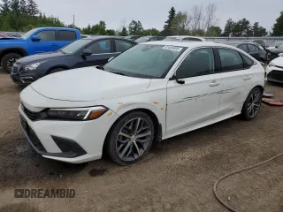 2023 Honda Civic Touring with VIN 2HGFE1F91PH000071, listed as a Copart auction lot 62405005 with 38,667 mi miles and Salvage title. Bid and sale history available at DreamBid. Image 1.