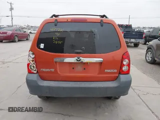 2006 Mazda Tribute i with VIN 4F2YZ02Z96KM08546, listed as a IAAI auction lot 41554299 with Not Provided miles and . Bid and sale history available at carsss.com. Image 16.