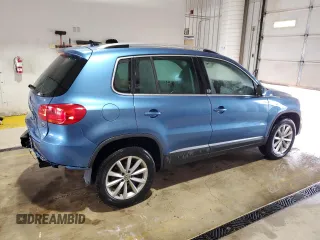 2017 Volkswagen Tiguan Wolfsburg Edition with VIN WVGSV7AX1HK014774, listed as a Copart auction lot 64456925 with 91,999 mi miles and Salvage title. Bid and sale history available at DreamBid. Image 3.