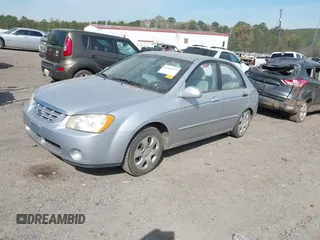 2005 Kia Spectra LX with VIN KNAFE121355203561, listed as a IAAI auction lot 41894533 with 32,889 mi miles. Bid and sale history available at carsss.com. Image 2.