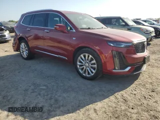 2020 Cadillac XT6 FWD Premium Luxury z VIN 1GYKPCRSXLZ101003, wystawiony jako Copart lot #51844525 z przebiegiem 115 061 mil mil oraz Szkoda całkowita • Salvage title. Historia ofert i sprzedaży dostępna na DreamBid. Obrazek 4.