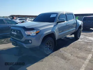 2021 Toyota Tacoma SR5 with VIN 5TFAZ5CN7MX101810, listed as a IAAI auction lot 42454418 with 58,930 mi miles and . Bid and sale history available at DreamBid. Image 19.