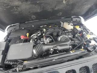 2023 Jeep Wrangler Sport z VIN 1C4HJXDG6PW597405, wystawiony jako Copart lot #88909255 z przebiegiem Nie podano mil oraz Szkoda całkowita • Salvage title. Historia ofert i sprzedaży dostępna na DreamBid. Obrazek 12.