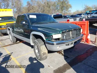 1998 Dodge Dakota SLT with VIN 1B7GG22X3WS573262, listed as a IAAI auction lot 40905093 with 148,684 mi miles and . Bid and sale history available at DreamBid. Image 1.
