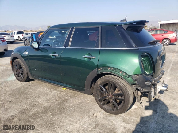 2016 MINI Cooper Hardtop 4 Door S with VIN WMWXU3C51G2D31535, listed as a Copart auction lot 42832355 with 95,458 mi miles and Salvage Title. Bid and sale history available at carsss.com. Image 2.