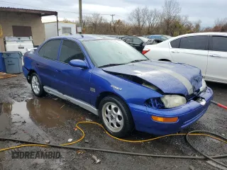 1994 Geo Prizm z VIN 1Y1SK5364RZ023169, wystawiony jako Copart lot #78828524 z przebiegiem 93 093 mil mil oraz Szkody całkowita. Historia ofert i sprzedaży dostępna na DreamBid. Obrazek 4.