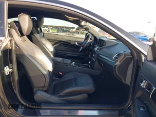 2016 Mercedes-Benz E-Class E 400 with VIN WDDKJ6HB9GF331994, listed as a IAAI auction lot 41953303 with 97,378 mi miles. Bid and sale history available at carsss.com. Image 5.